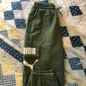 Green puma joggers